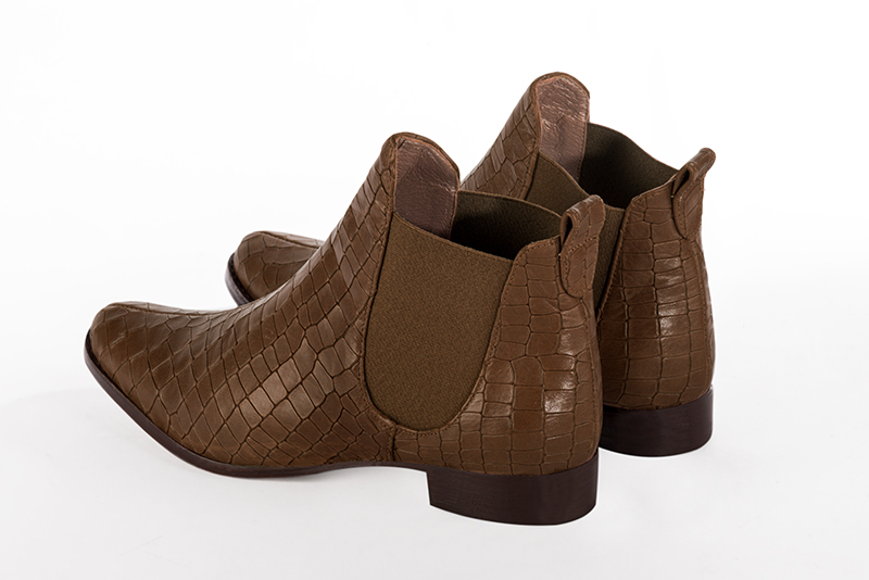Caramel brown women's ankle boots with buckles. Round toe. Flat leather soles. Rear view - Florence KOOIJMAN